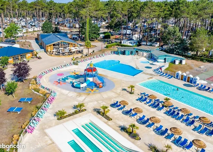 Bungalow Natherem, 3ch dont 1 suite parentale, 2 sdb à Saint Julien en Born dans camping 4 étoile